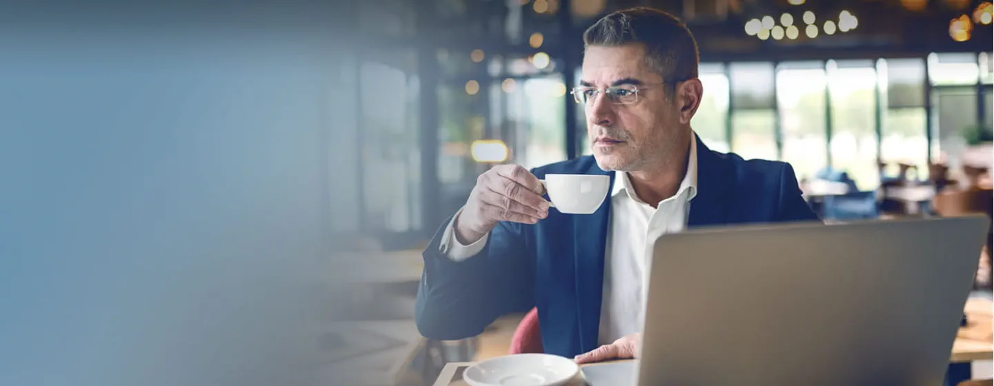 Businessman drinking coffee