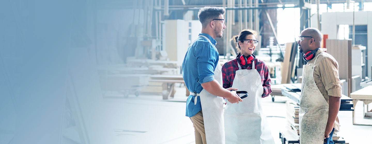 Factory employees talking on a break