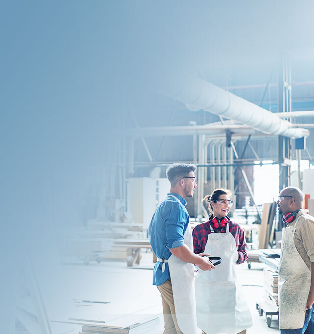 Factory employees talking on a break