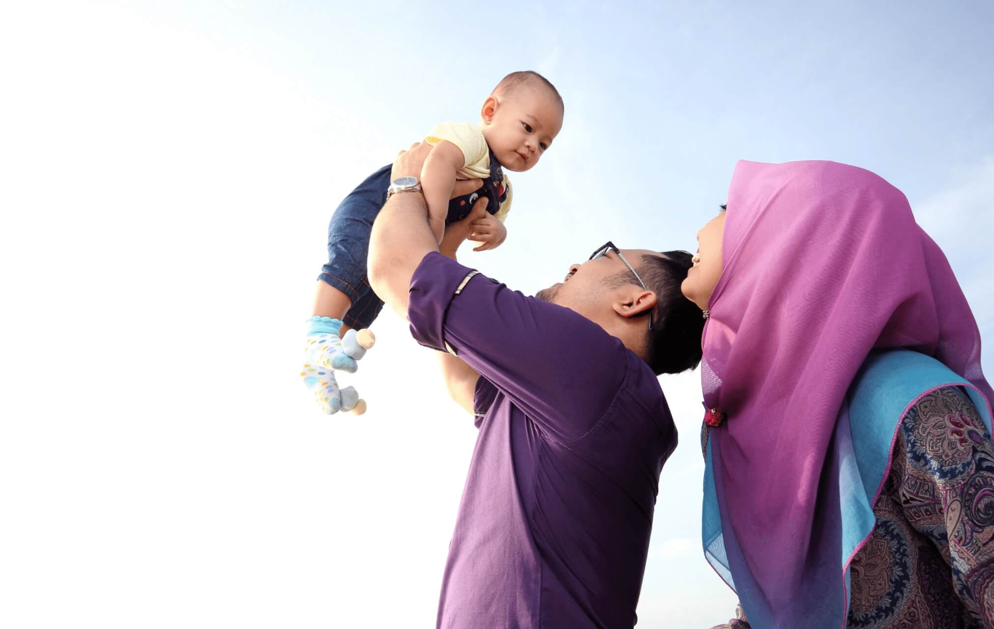 Father lifting his baby