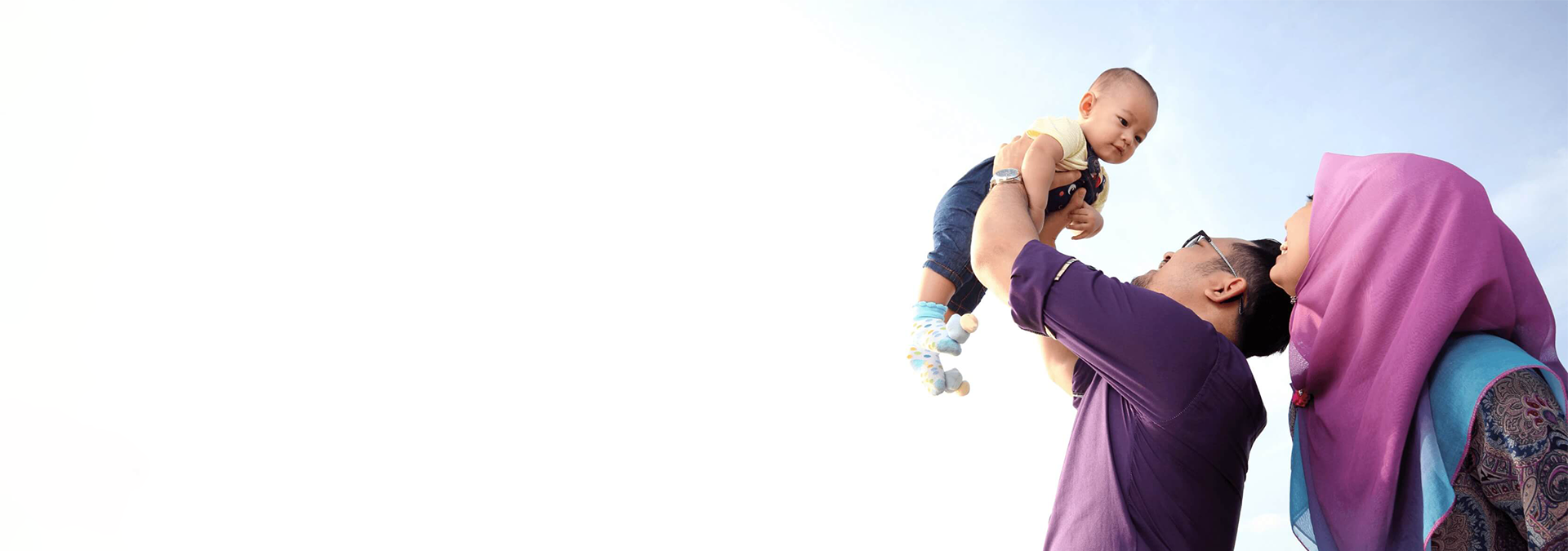 Father lifting his baby